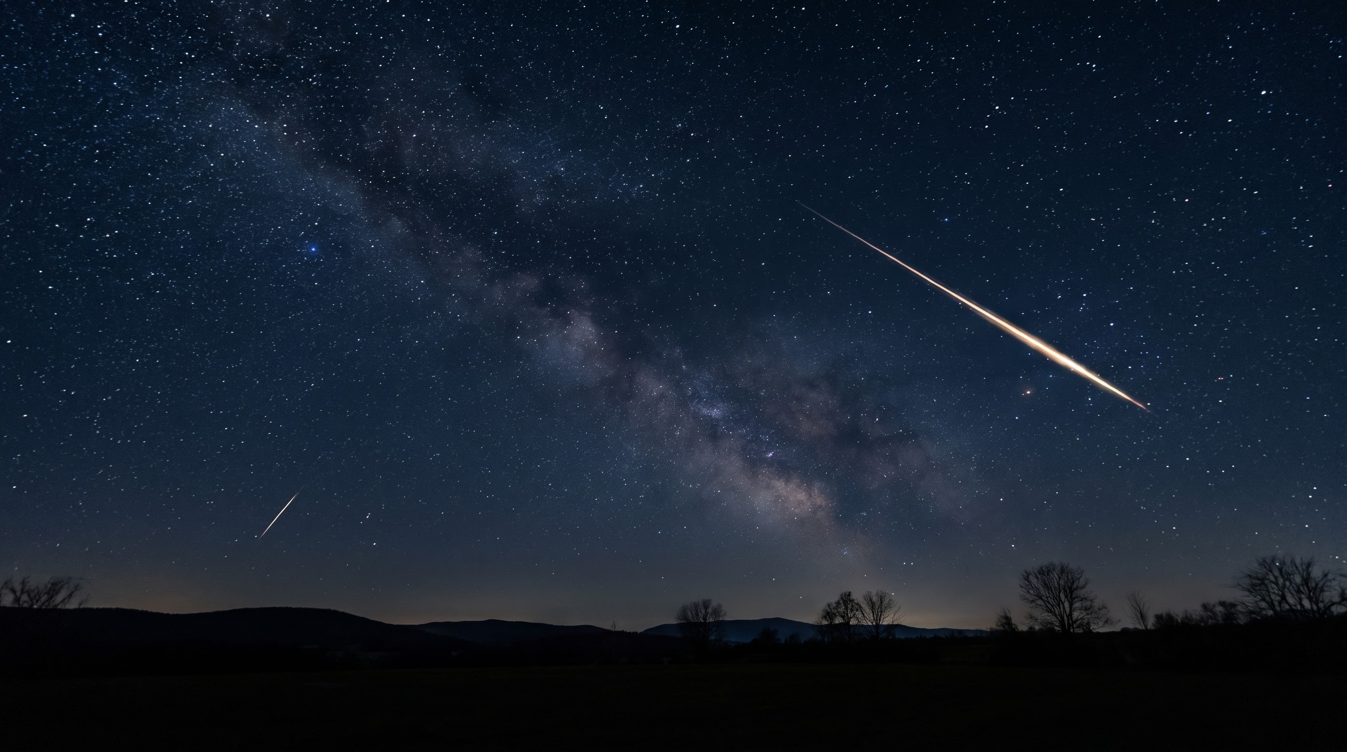 Meteor streaking across the night sky during a September 2026 meteor shower